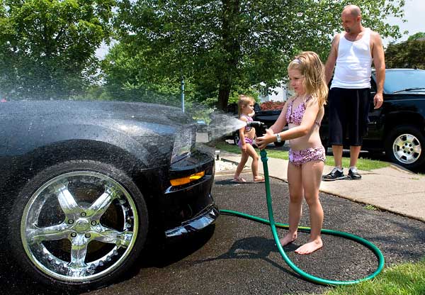 It is much easier to simply ask for a donation than to set a car wash fee